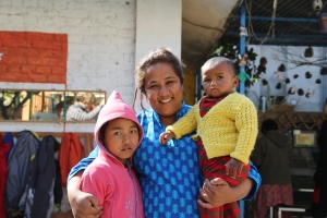 Pushpa Basnet with Sanu (left), the first child she met and rescued from prison life eight years ago . Fourteen month old Pushpanjali (right) is her youngest ward. (copyright Donatella Lorch)