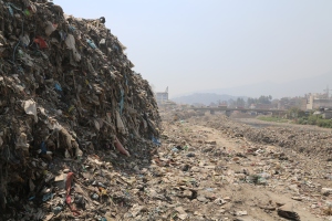 A mountain of garbage, mostly plastic bags dredged from the fetid (and holy) Bagmati River. © Donatella Lorch