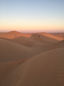 Hiking along the dunes at sunset after the desert begins to cool down. © Donatella Lorch